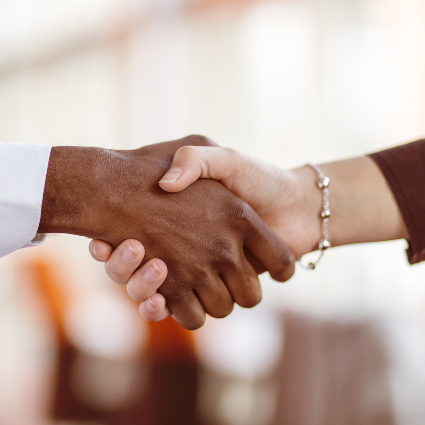 man and woman shaking hands