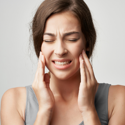 woman with jaw pain