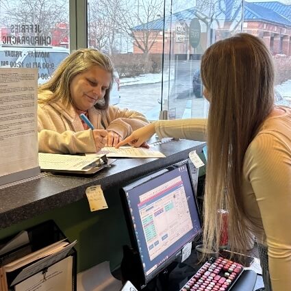 Patient checking in at reception