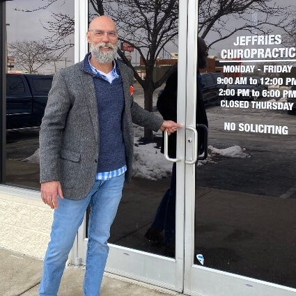 Nicholasville chiropractor Dr. Jeffries standing in front of Jeffries Chiropractic entrance