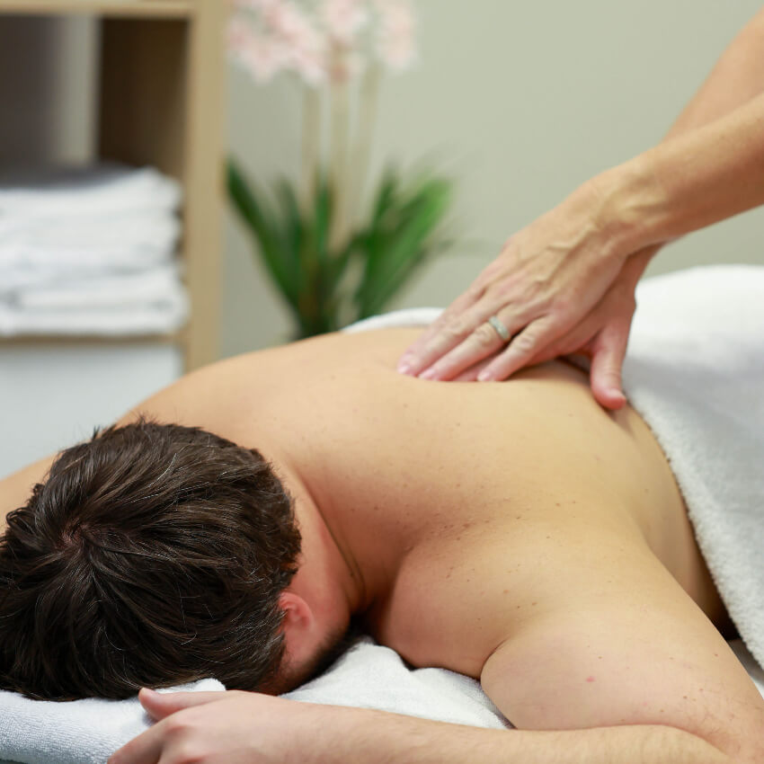 patient having shoulder massage