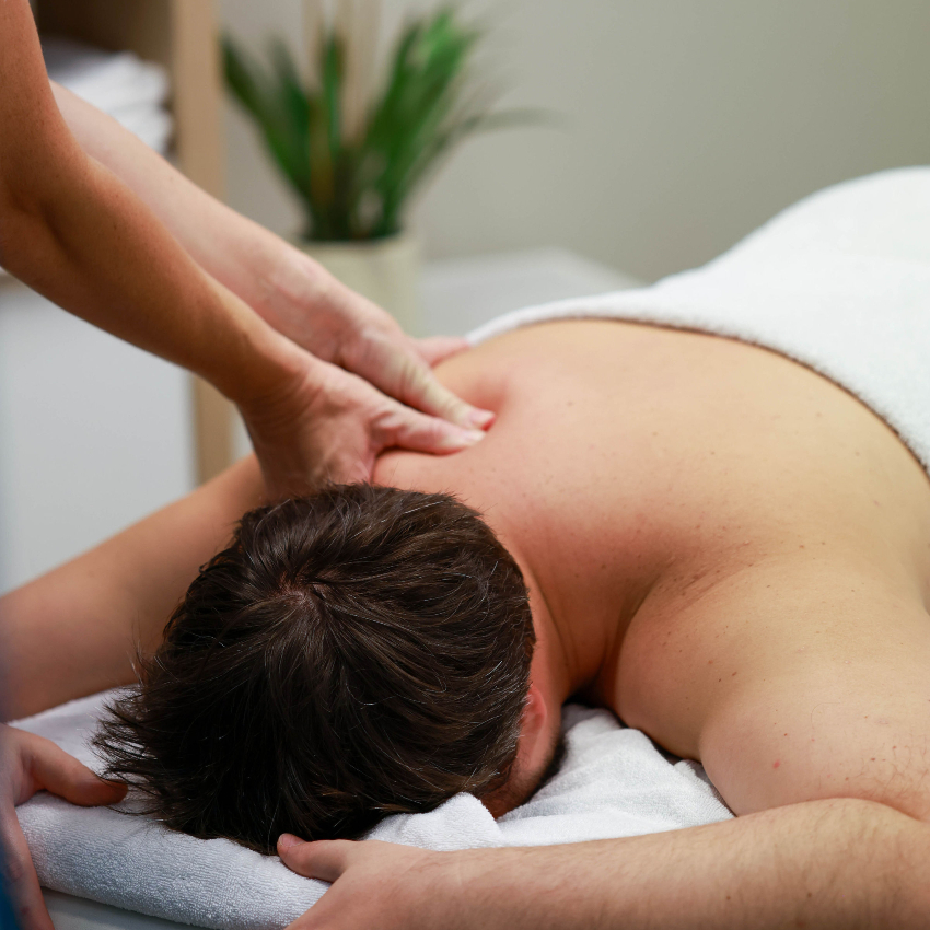 patient having shoulder massage