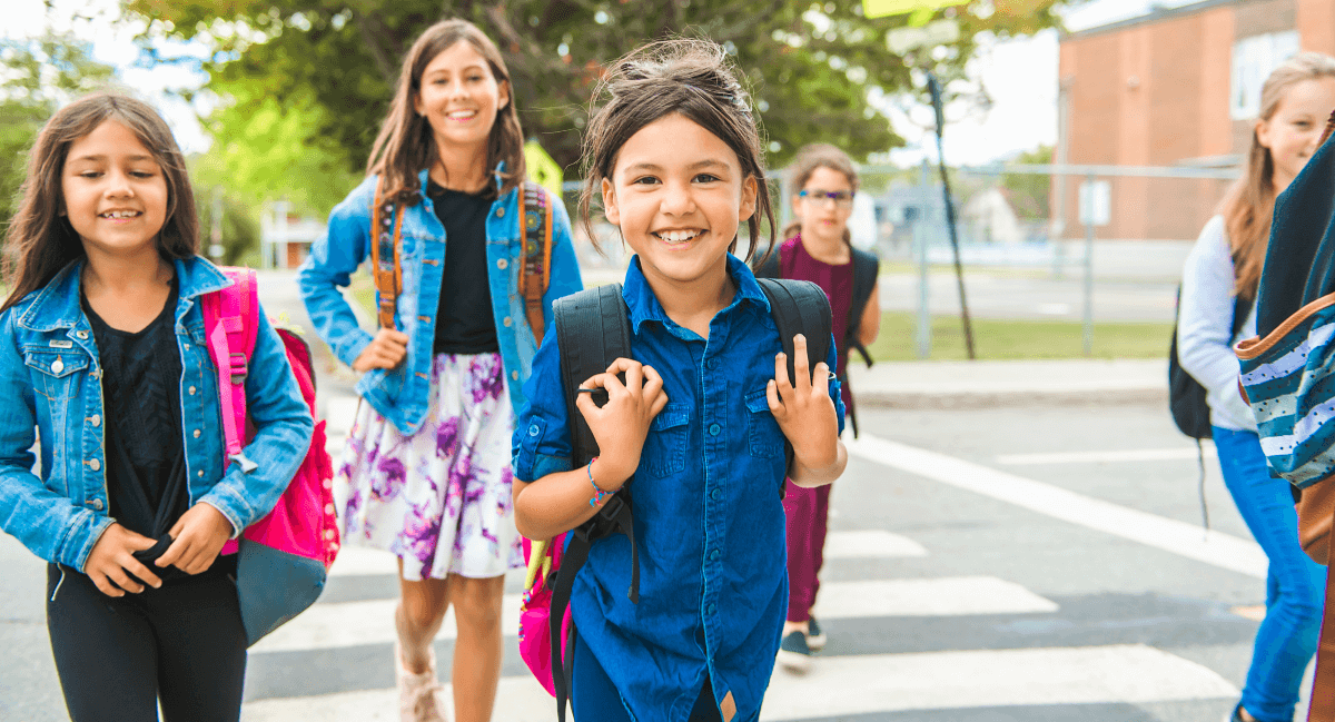 Group of girls wearing backpacks