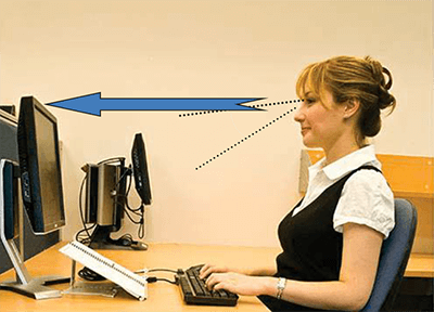 woman looking at computer screen