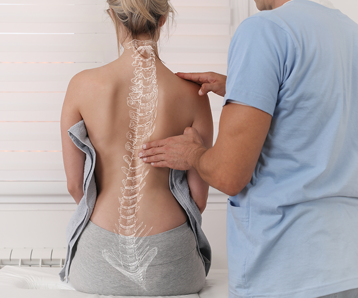 adjusting woman's back
