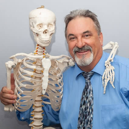 Dr. Komrey with skeleton