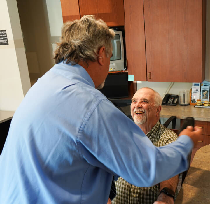 Cadott chiropractor Dr Dalton using tool on patients back