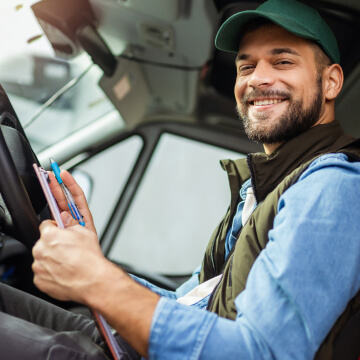 man filling out paperwork