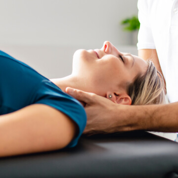 adjusting patient's neck