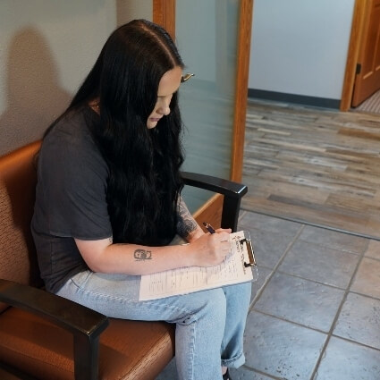 patient filling out forms