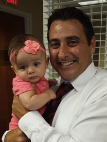 Baby with head tilt after chiropractic adjustment with Dr. Verne.