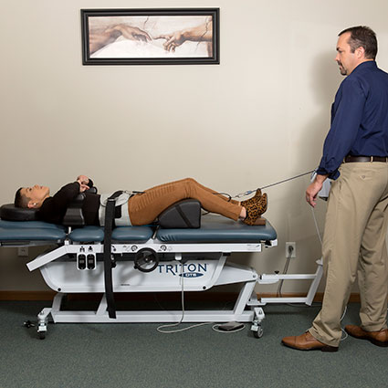 Patient on spinal decompression table