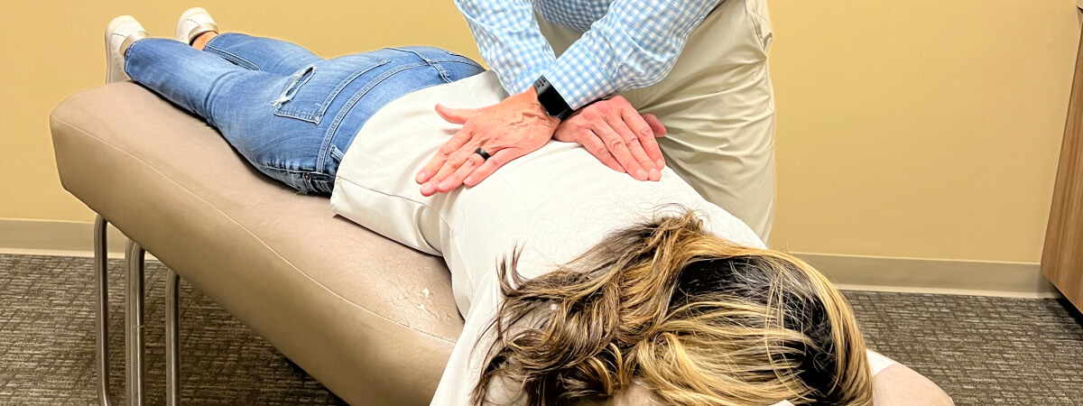 Winston-Salem chiropractor adjusting a female patient