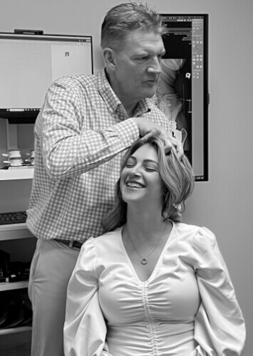 Winston-Salem Chiropractor Dr. Erickson adjusting woman