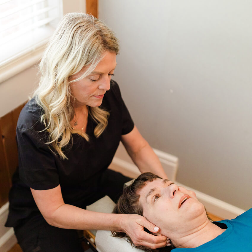 Patient having neck adjusted