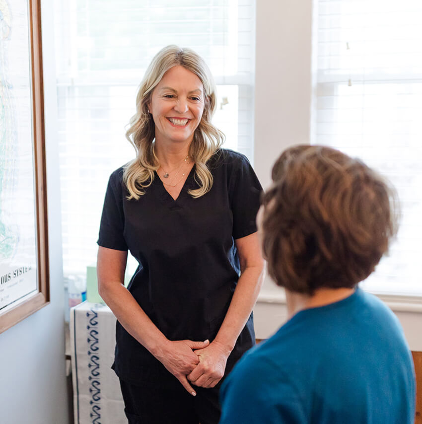 Dr Terri talking with patient