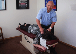 Dr. Blaine, Wasilla Chiropractor, adjusting a patient