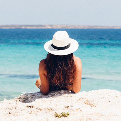 person relaxing on beach