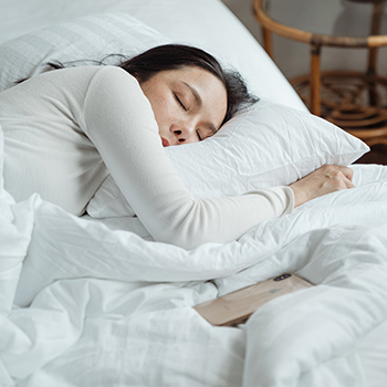 woman sleeping in a bed