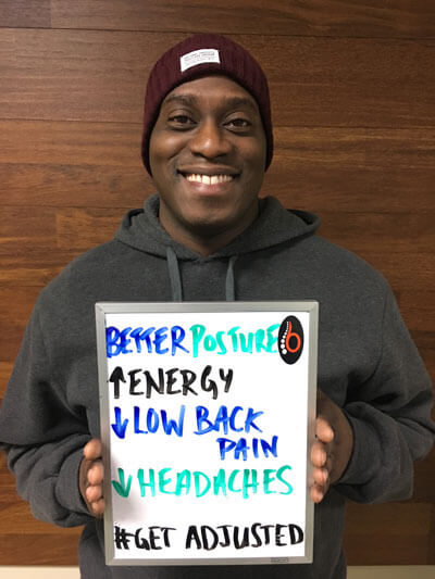 Holding testimonial sign