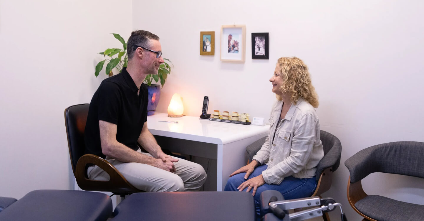 Dr. Sean talking to patient