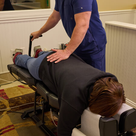 Midlothian Patient receiving spinal rehabilitation therapy