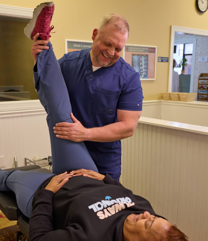 Dr. Shawn adjusting patient