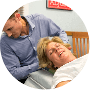 woman getting neck adjustment