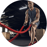 man exercising with ropes