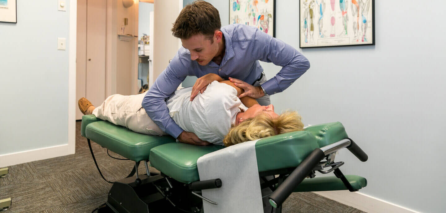 Harvard Chiropractic Chiropractor Dr. Mitchell adjusting patient