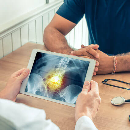 doctor and patient looking at xray