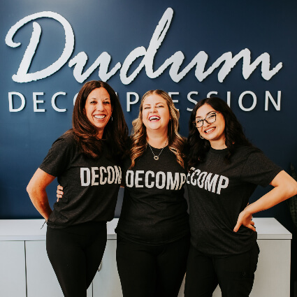 Dudum Chiropractic team members laughing