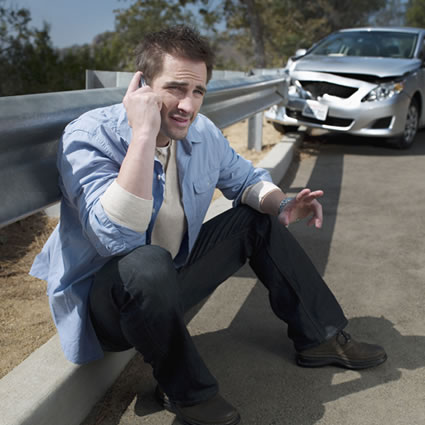man on phone after crash