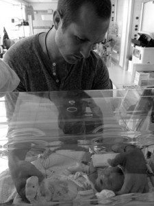 Dr. Kasten adjusting an infant Asheville Chiropractic adjusts infant