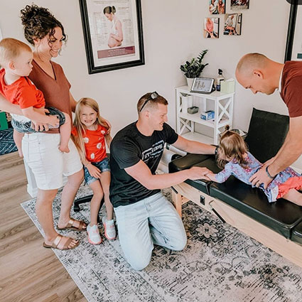 Family in adjusting room