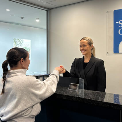 Greeting patient at the reception desk