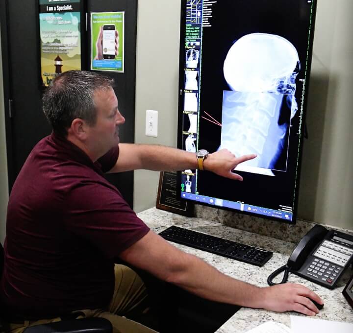 Dr. Mark pointing at X-ray