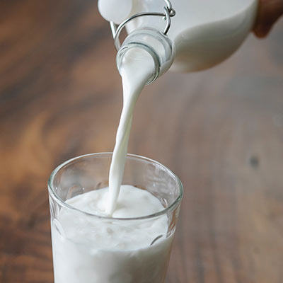milk pouring in to a glass