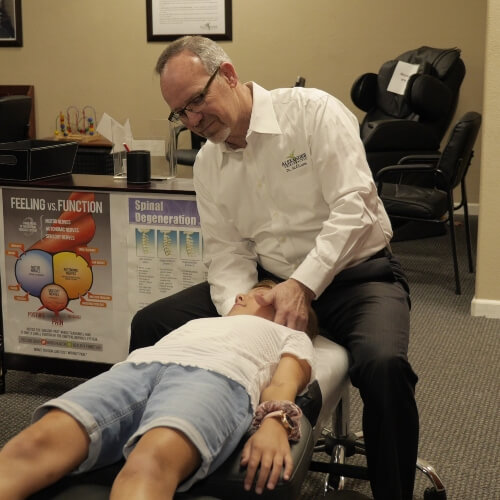 Livermore chiropractor adjusting a child