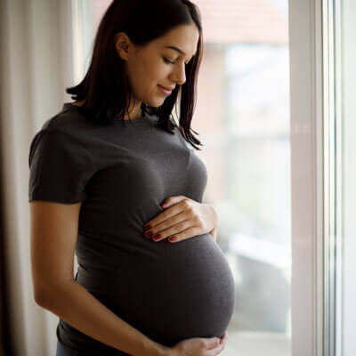 pregnant mama standing