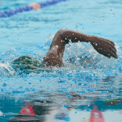 person swimming in pool