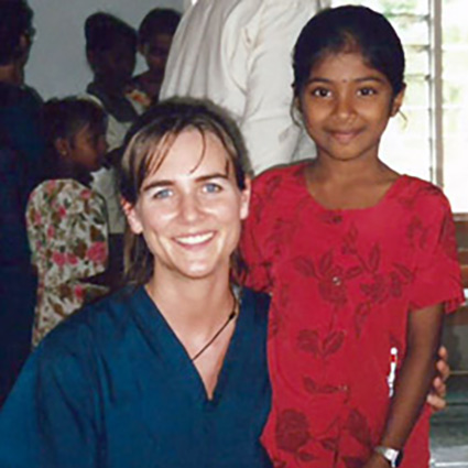 Dr Audren with girl in fiji