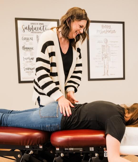 Doctor adjusting patient