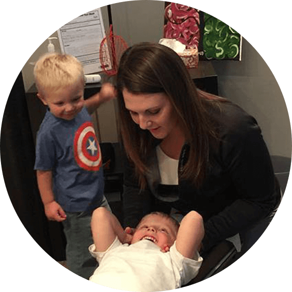 Dr. Lindsey adjusting child