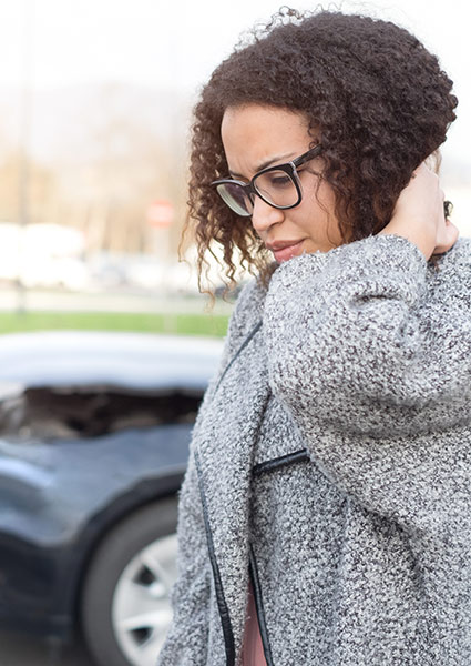 woman with neck pain after an auto accident