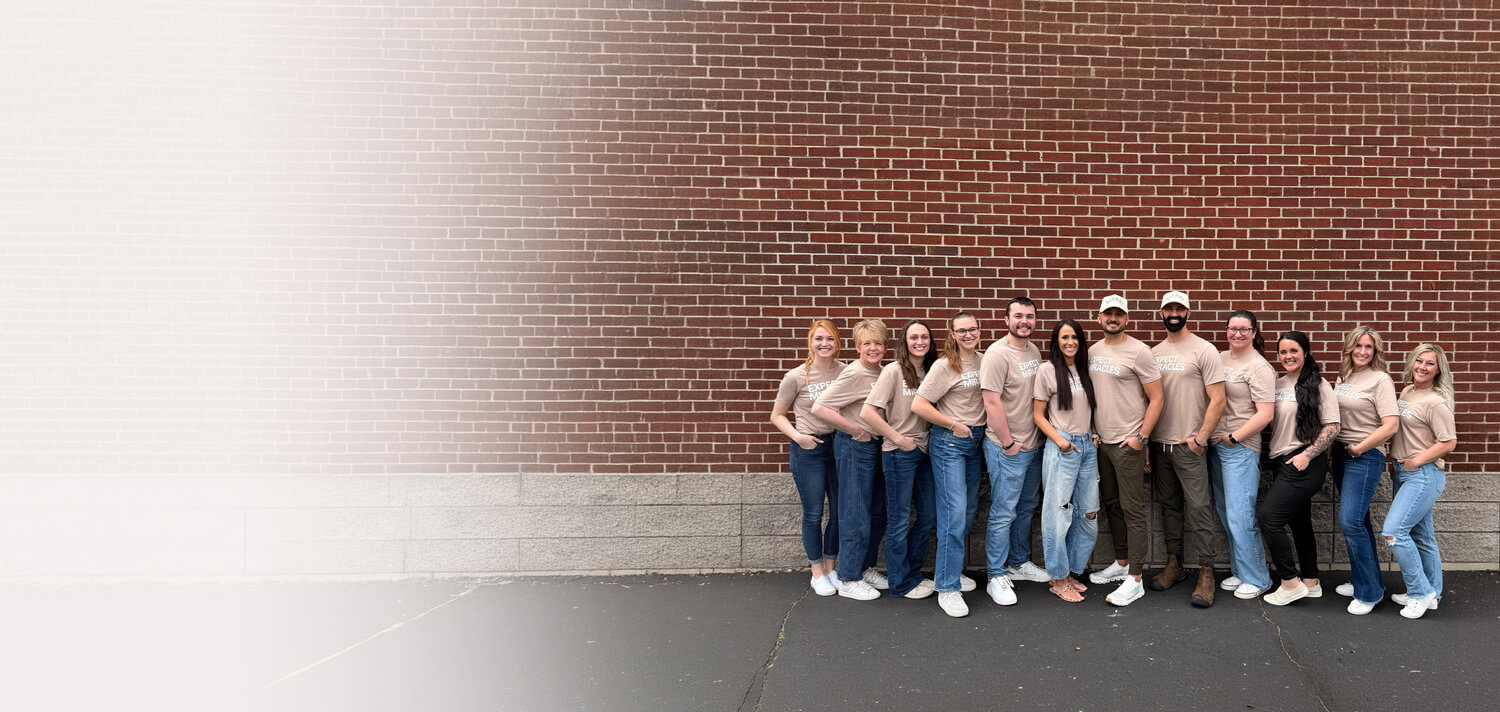 Innate Health Chiropractic Chiropractors smiling outside