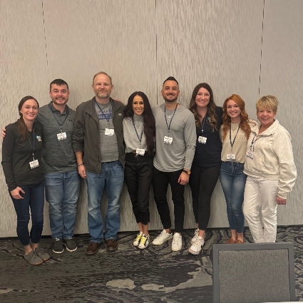 Dr Mike with a group of people