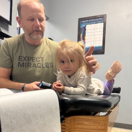 Dr Mike adjusting child