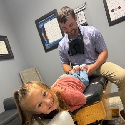 Dr Zack adjusting child