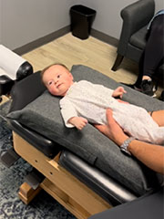 baby patient laying on table